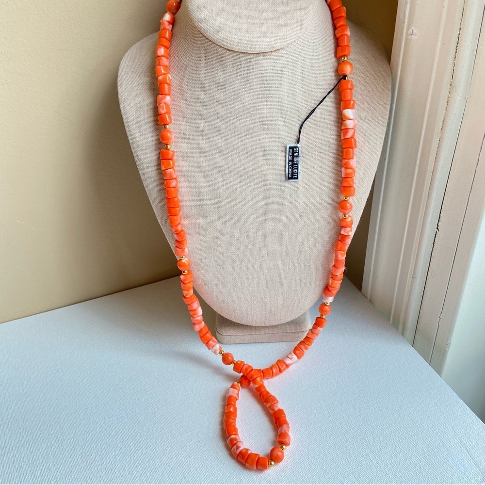 Lucite orange and white swirl continuous beaded necklace with goldtone spacers